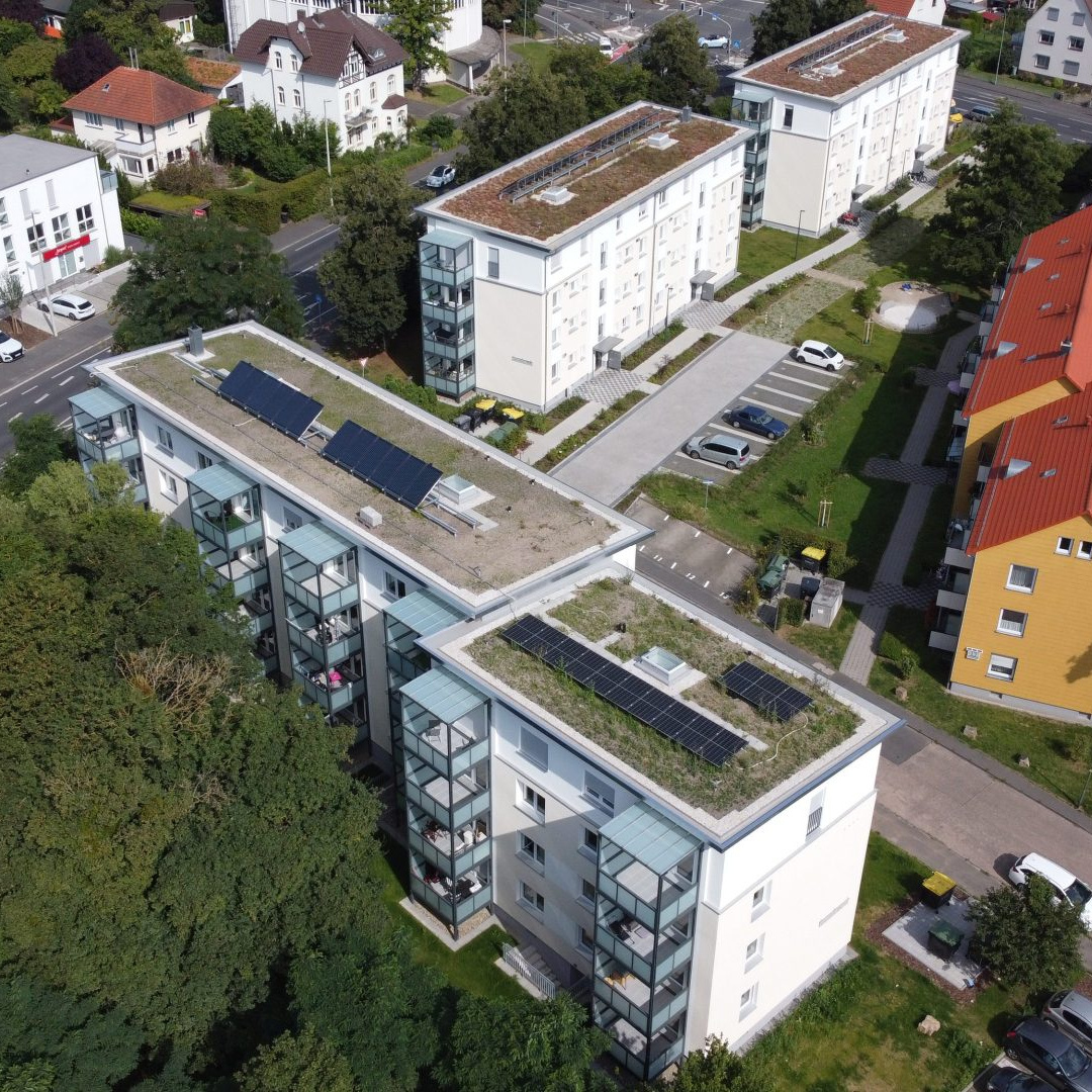 Blick von oben auf das modernisierte NHW-Quartier in Kassel-Harleshausen mit Aufstockungen